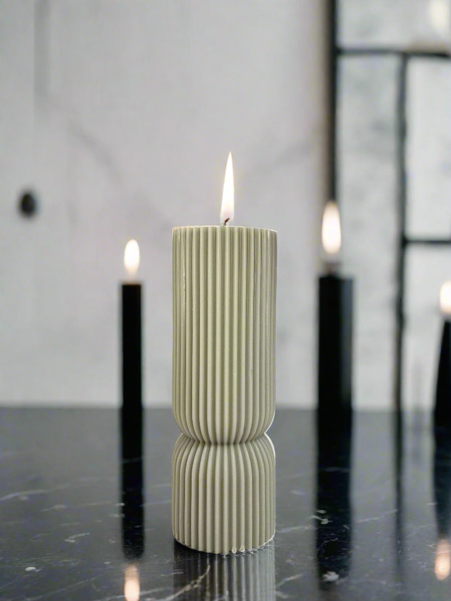 Luxury pastel pillar candle with masculine Millionaire Man fragrance, perfect for home decor and gifting